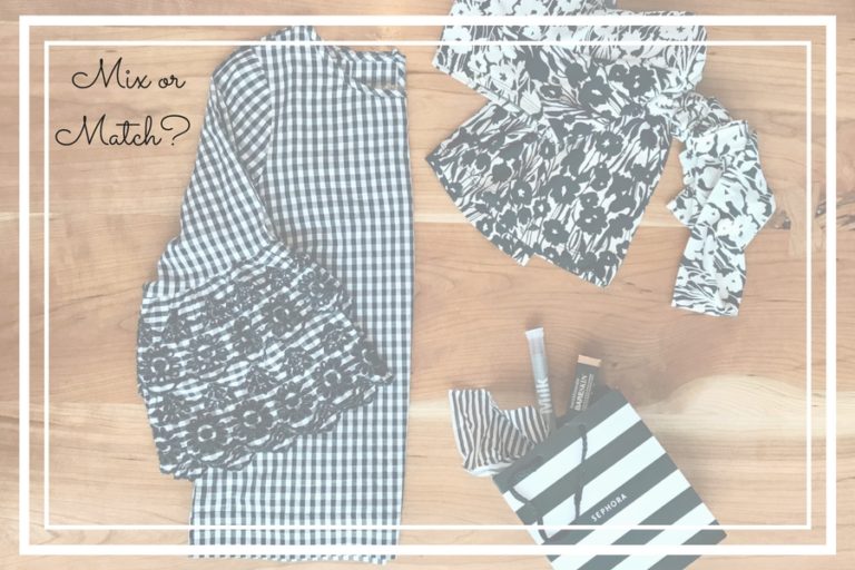 Flat lay of gingham check blouse, stripe bag and floral top.