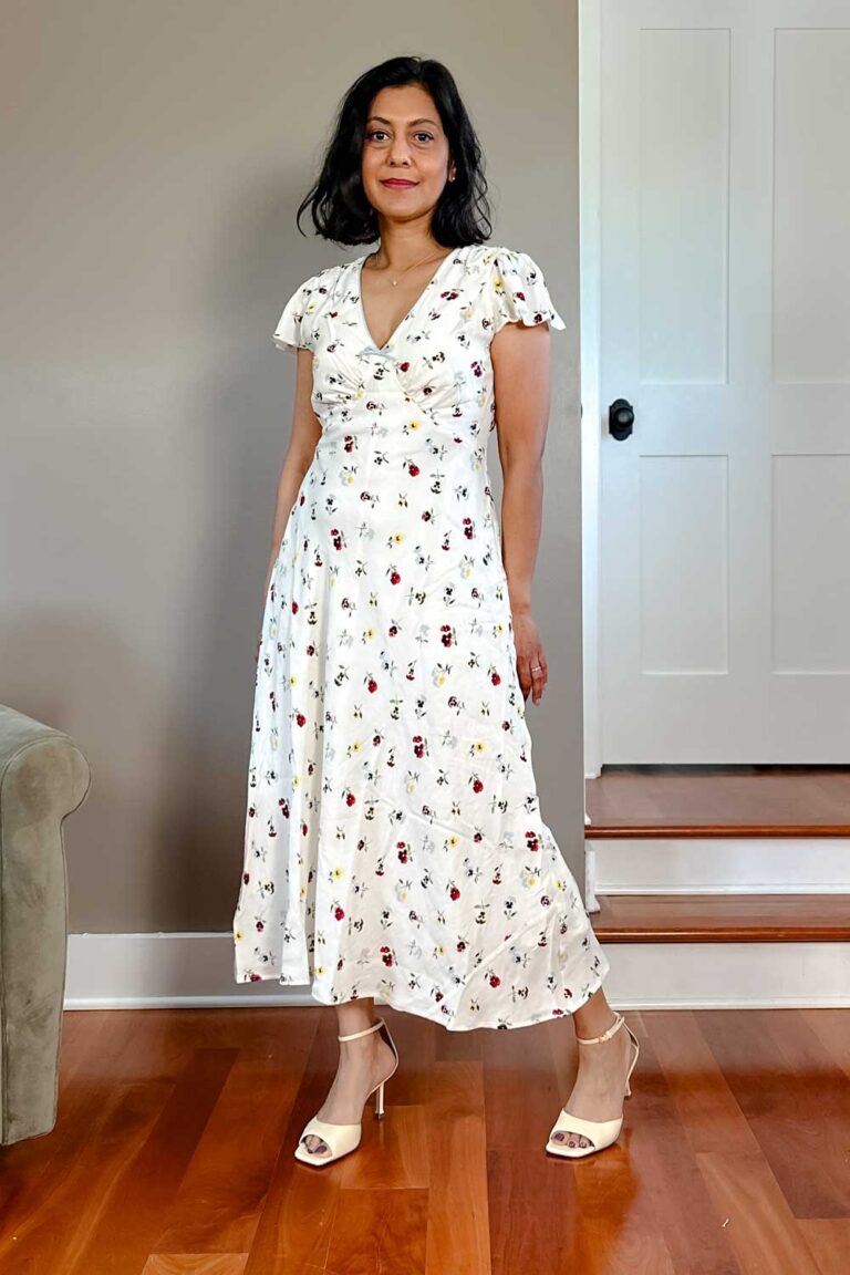 Fashionipa (Nipa) wearing a white floral dress