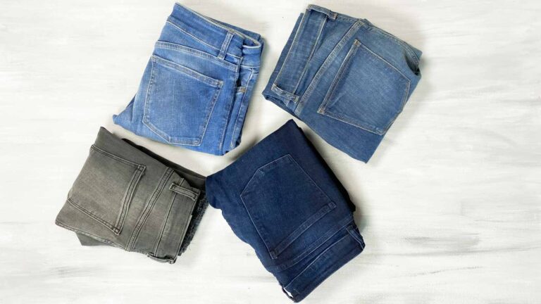 4 pairs of jeans, folded.