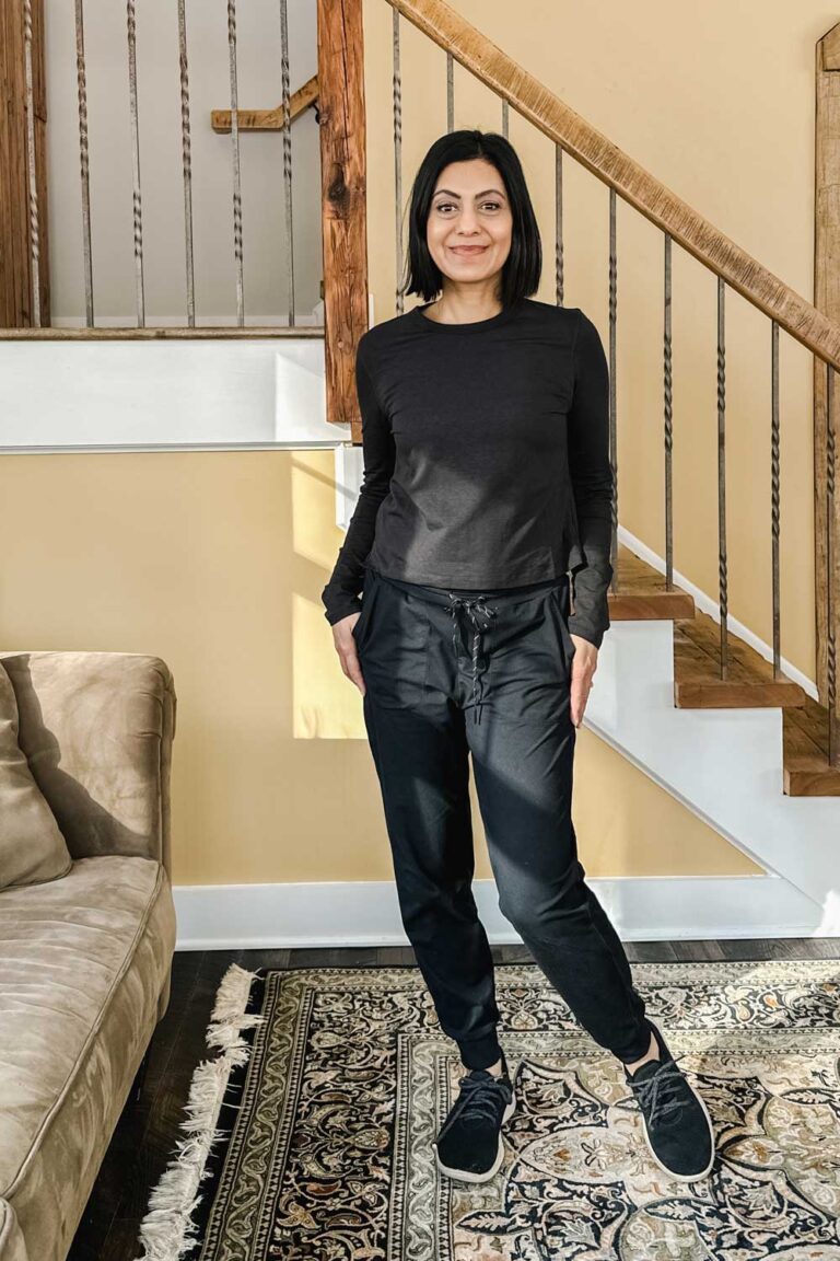 Fashionipa (Nipa) wearing black joggers, a loose T-shirt and sneakers.