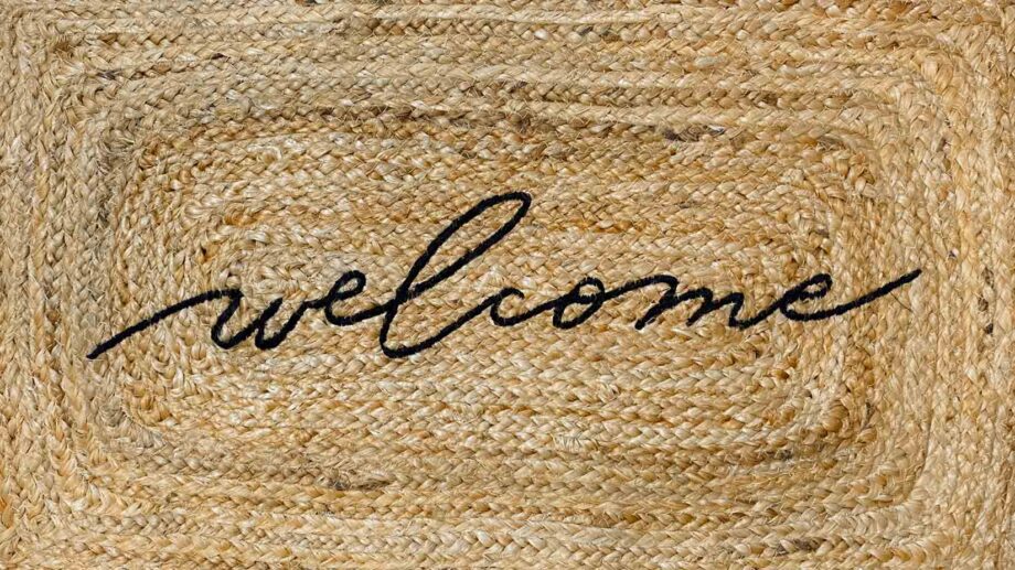 Jute doormat with welcome embroidered in the center