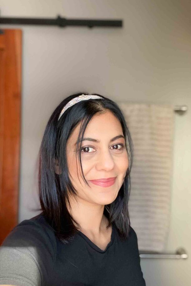 Fashionipa wearing a beaded headband