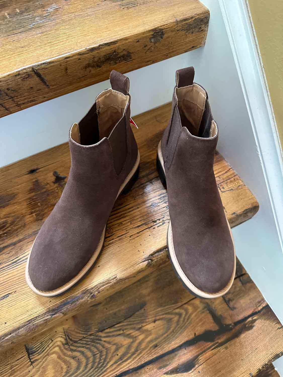 Brown suede boots with lug soles.  