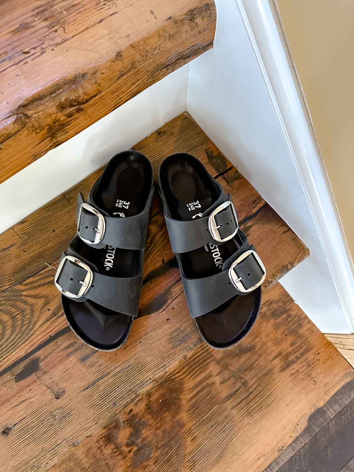 Image of Birkenstocks Arizona Big Buckle Sandals in black with silver buckles 