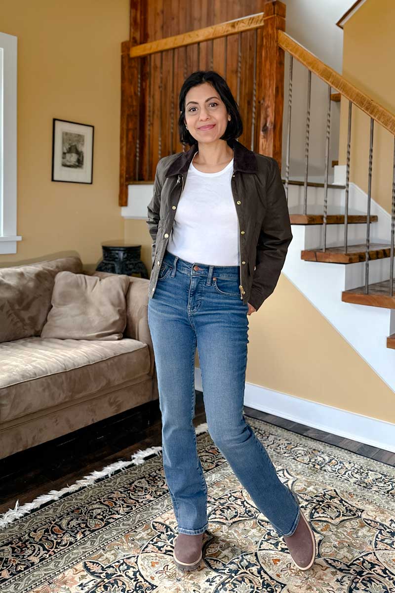Fashionipa (Nipa) wearing a white t-shirt slim bootcut jeans and chocolate boots.