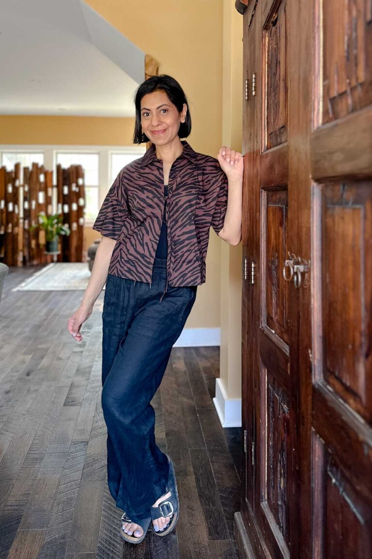 Fashionipa (Nipa) wearing a cotton poplin tie front top in a black and brown zebra print.