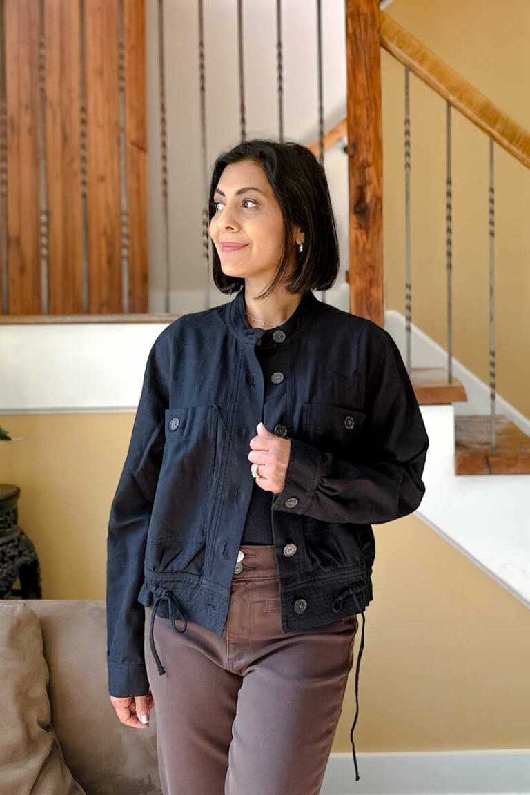 Fashionipa (Nipa) wearing a black collarless jacket.