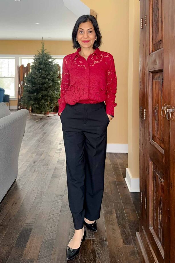 Fashionipa (Nipa) wearing a red lace blouse, black pants and pointed flats.
