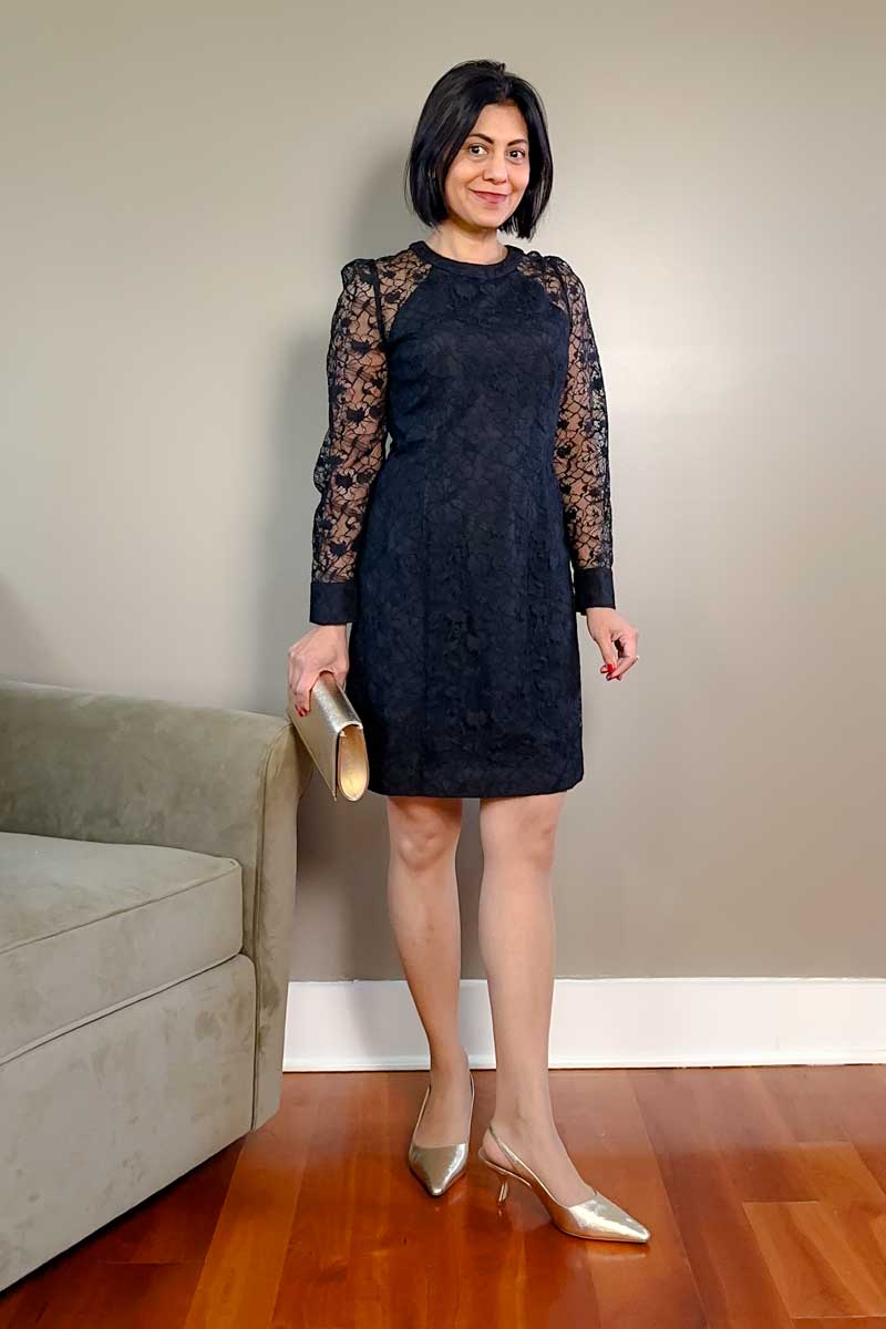 Fashionipa (Nipa) wearing a black lace dress and black leather sling-backs.