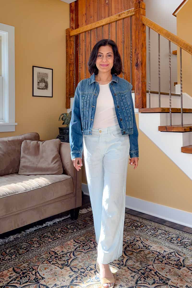 Fashionipa (Nipa) wearing a denim jacket, white tee, and blue linen pants.