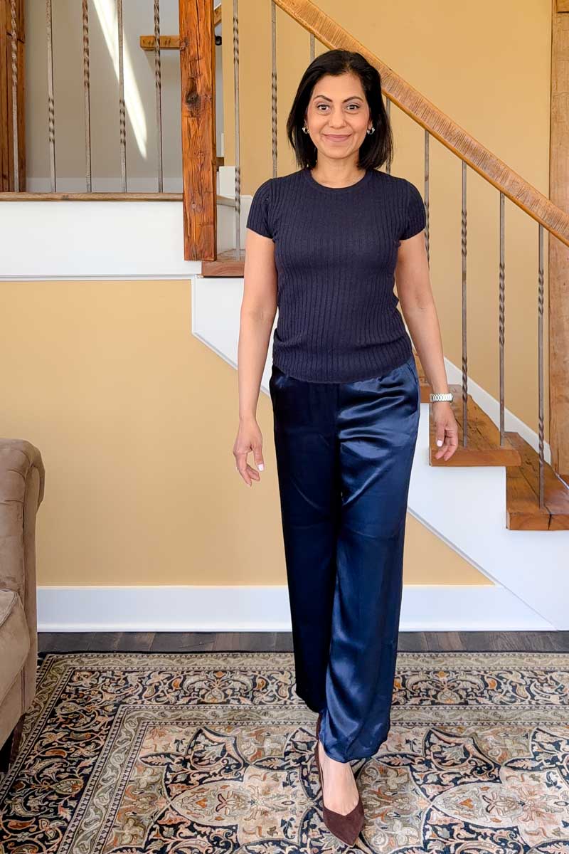Fashionipa (Nipa0 wearing satin pants with a short sleeved sweater and heels.