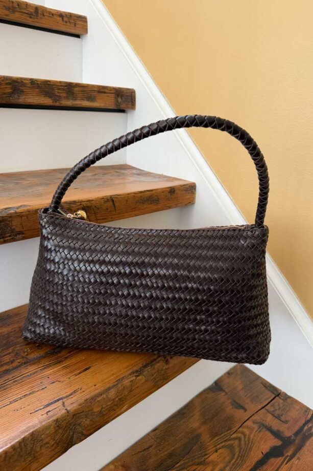 Woven leather handbag. 