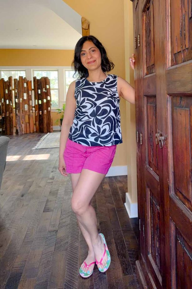 Fashionipa (Nipa) wearing an abstract print sleeveless top with pink shorts.