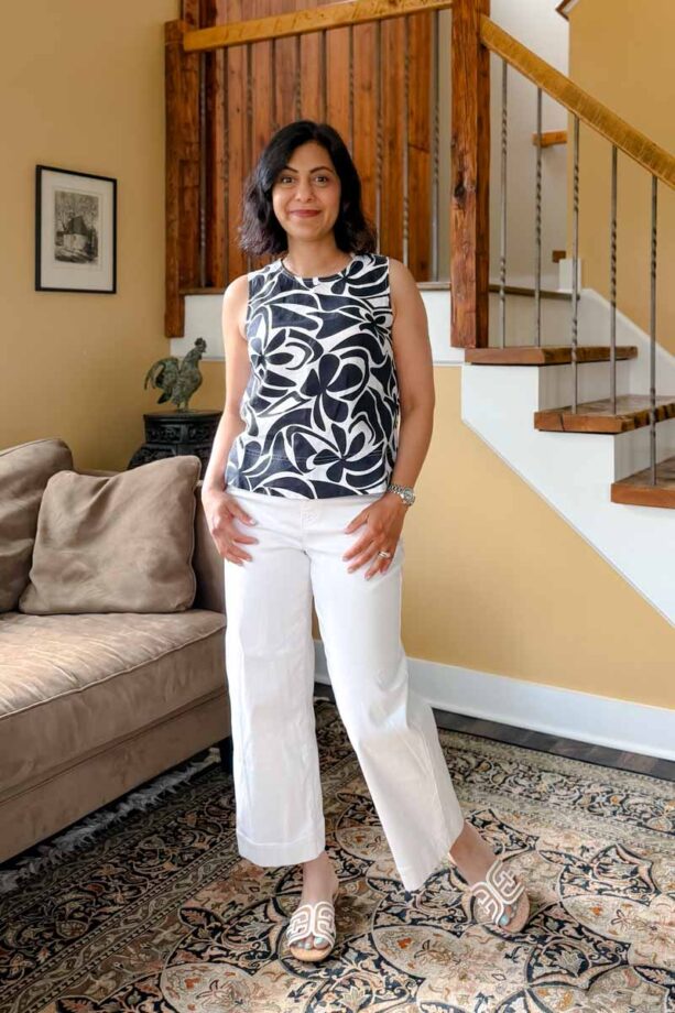 Fashionipa (Nipa) wearing an abstract print sleeveless top with white pants. 