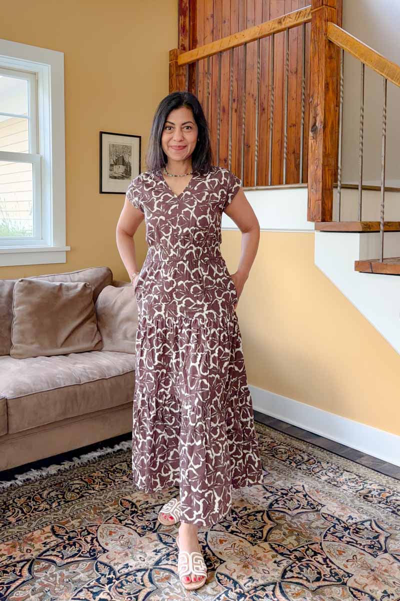 Fashionipa (Nipa) wearing a printed brown and ivory V-neck midi dress.