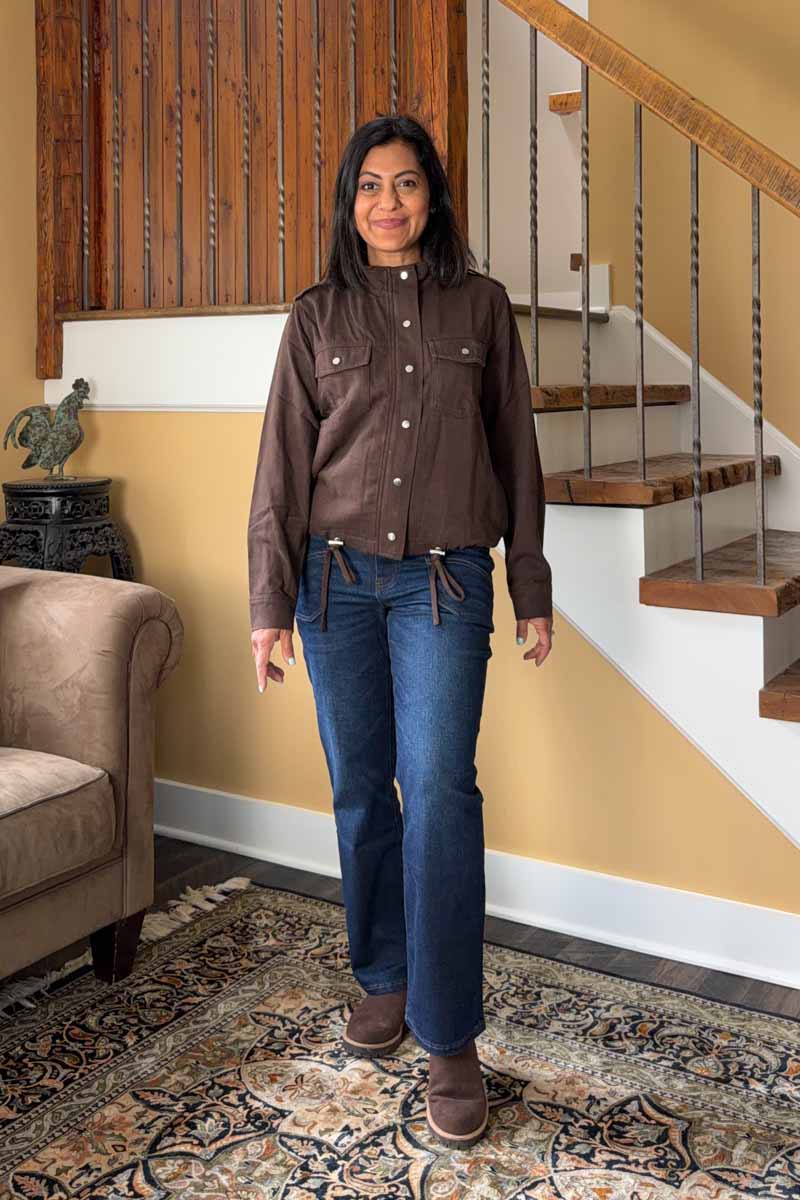 Fashionipa (Nipa) wearing a chocolate jacket with jeans.