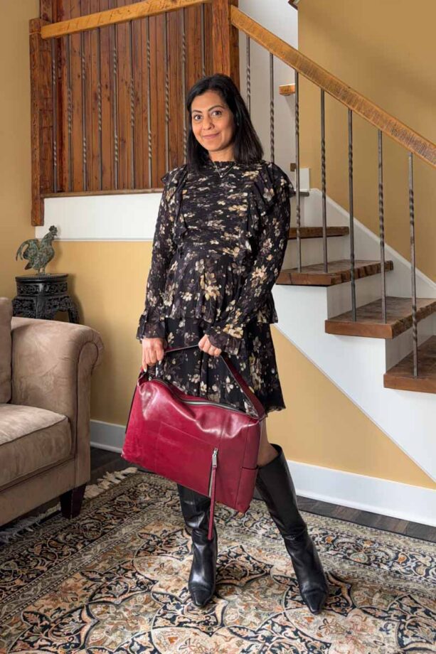 Fashionipa (Nipa) wearing a floral print mini dress, boots and a red handbag.