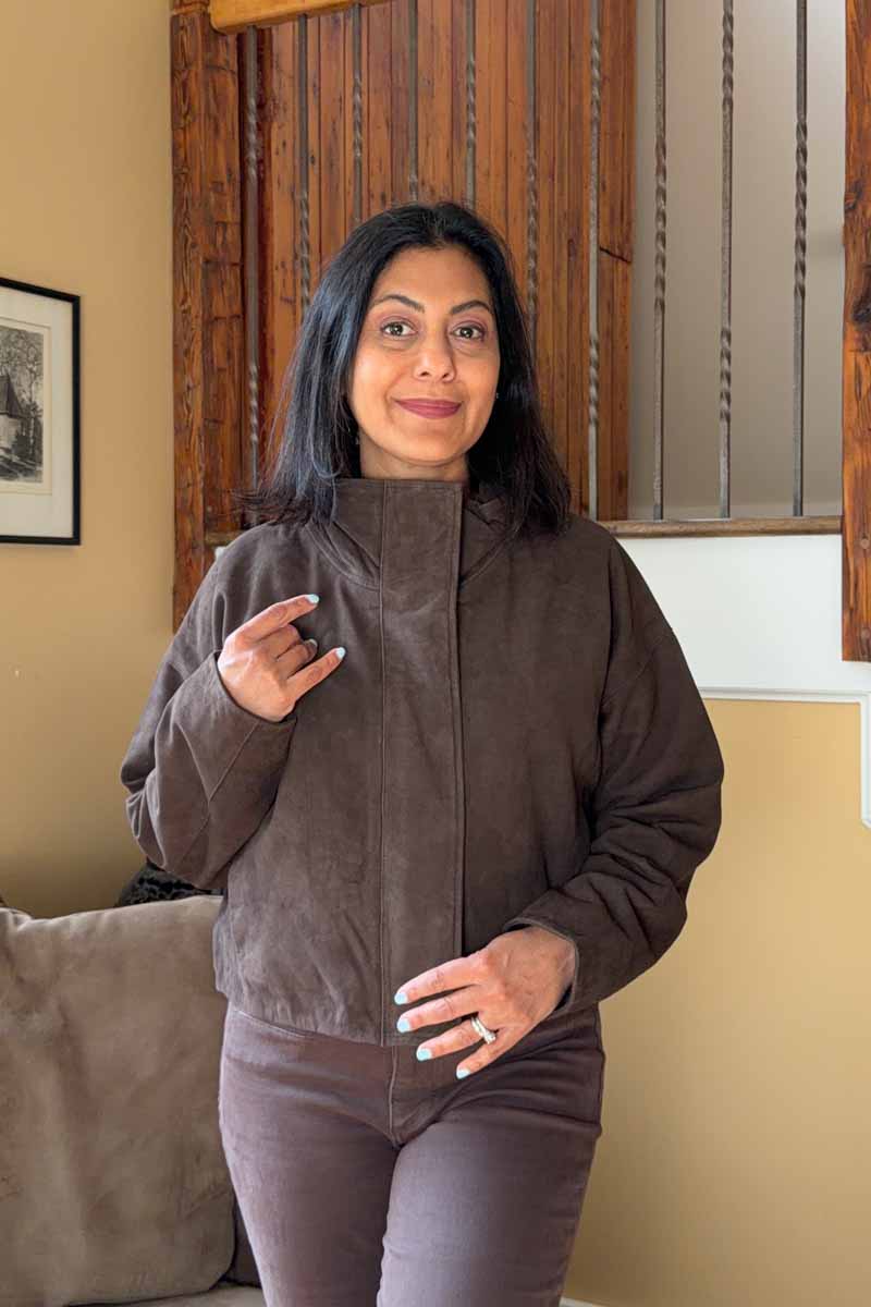 Fashionipa (Nipa) wearing a brown suede jacket.
