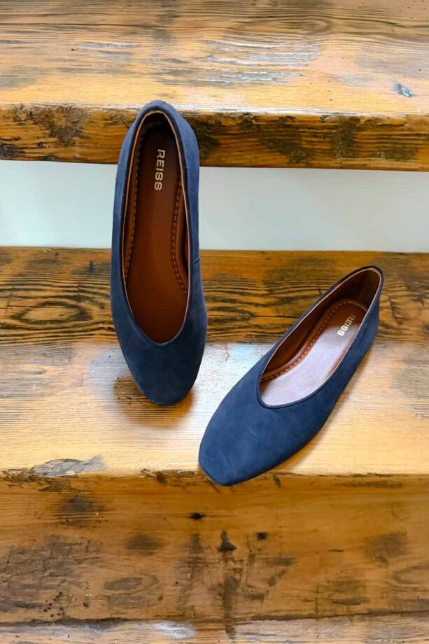 High vamp navy suede ballet shoes.