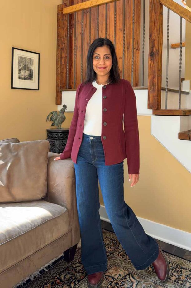 Fashionipa (Nipa) wearing a white t-shirt, jeans, a sweater jacket and Chelsea boots.