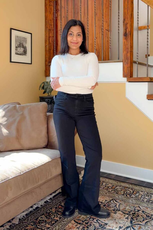 Fashionipa (Nipa) wearing a white t-shirt, black jeans, and Chelsea boots.