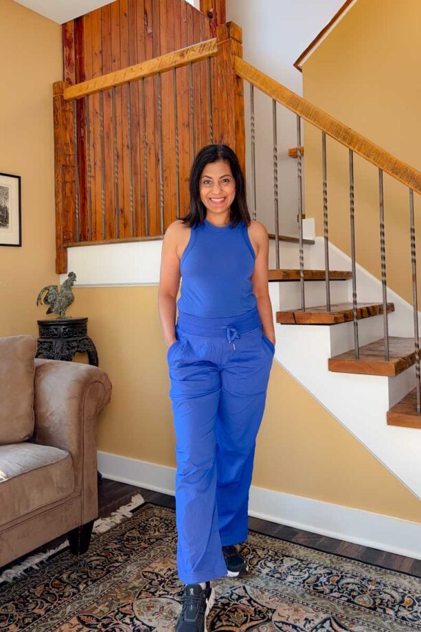 Fashionipa (Nipa) wearing a blue tank top, blue pants and black sneakers.
