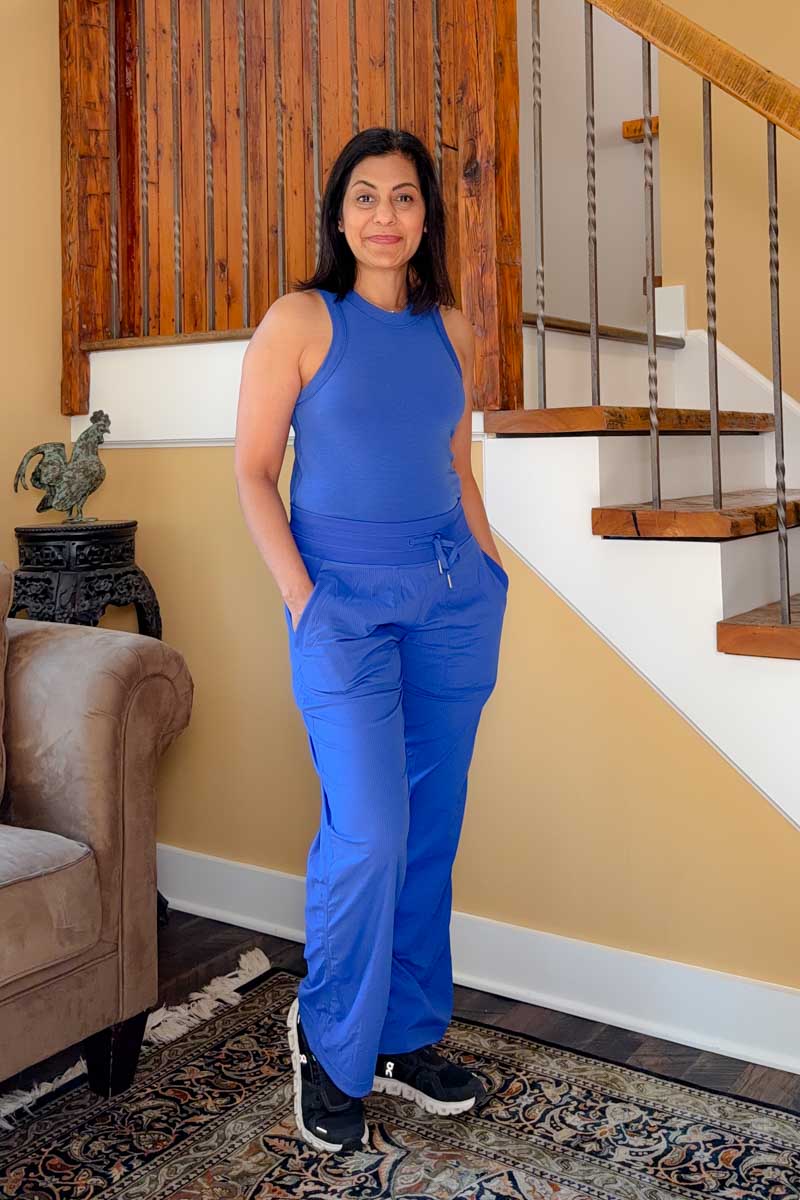 Fashionipa (Nipa) wearing a blue tank top, blue pants and black sneakers.