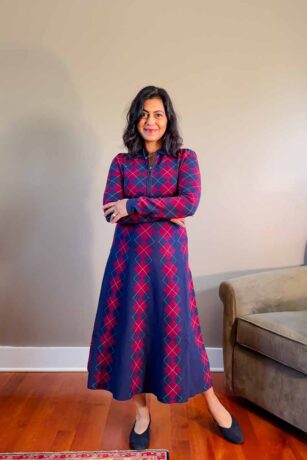 Fashionipa (Nipa) wearing a magenta and blue argyle patterned knit midi dress and blue ballet flats.