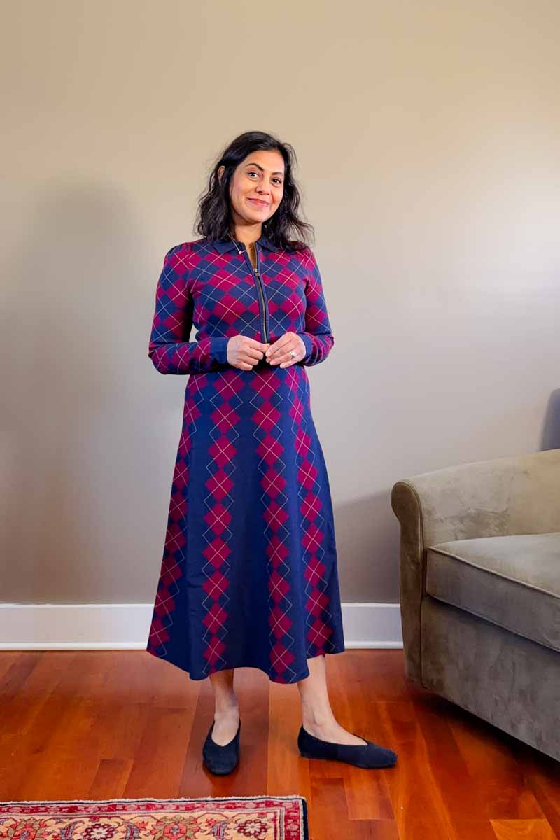Fashionipa (Nipa) wearing a magenta and blue argyle patterned knit midi dress and blue ballet flats.
